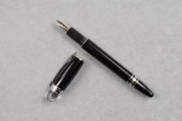 A Montblanc fountain pen. A Montblanc Starwalker fountain pen in black and silver with 14k nib.