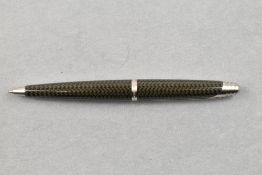 An Alfred Dunhill Ballpoint pen having carbon fibre effect barrel and cap, with box, no