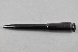 An Alfred Dunhill limited edition ballpoint pen. In black with glitter effect. Number 311/888. Boxed