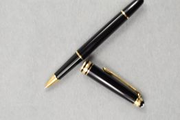 A Montblanc rollerball pen. A Montblanc Meisterstuck 75 Years of Passion rollerball pen in black