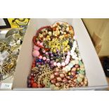 A tray of costume necklaces, beads etc