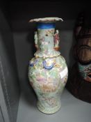 A large Chinese export hard paste floor vase, decorated in a Cantonese palette with moulded lizard
