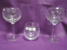 Two modern Cumbria Crystal wine glasses and a tumbler in the Selene pattern