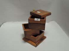 A 20th century storage box with swivel mechanism in mahogany.