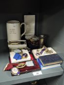 A selection of 20th century Masonic and Goodfellows enamel badges with silver cup and mug