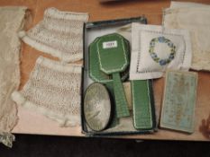 A selection of vintage dressing table items, an advertising box of antique hook and eyes, pin