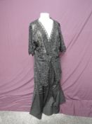 A late Victorian/Edwardian black cotton tulle lace over jacket, press stud fastening, fully lined
