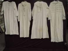 Four Victorian cotton nightdresses.