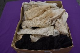 A box full of lace, crotchet, tatting and more, a couple of partial garments included also, a useful