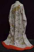 An incredibly heavy and long quilted oriental silk Kimono or gown, this is extensively embroidered