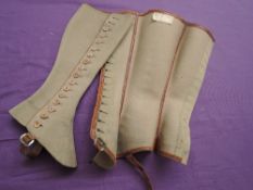 A pair of Edwardian grey wool ladies button up gaiters, paper labels present to insides.