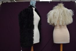A 1920s/30s marabou stole, a cream ostrich or similar capelet and a later boa in blue.