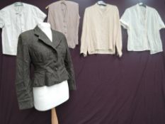 A collection of four vintage blouses and a suit jacket, predominantly circa 1950s.