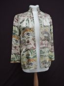 A mid century oriental style jacket having tassels to collar, pockets to sides and decorated with