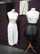 Four Victorian and Edwardian aprons including lace with taffeta edge.