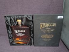 A bottle of Kilbeggan Finest Irish Whiskey aged 15 Years, Distilled at the Old Kilbeggan Distillery,