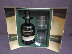 A bottle of Connemara Peated Single Malt Irish Whiskey, 70cl, 40% vol with two glasses in card