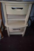 A pair of modern light laminate bedside tables with single drawer and undershelf