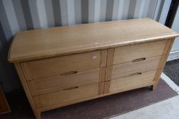 A modern lightwood sideboard or bedroom chest of three by three drawers, width approx. 152cm
