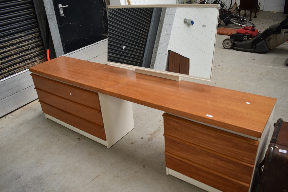 A vintage teak and laminate dressing table