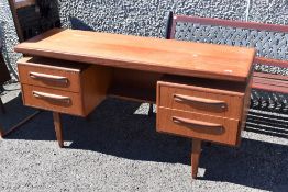 A vintage teak G plan dressing table , been used as sideboard/desk, mirror and arms removed but