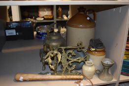 A selection of vintage hardware including salt glazed flagon, brass trivet with kettle, wooden baton