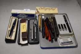 A mixed lot of vintage and antique pens, including early rubber examples, Parker Duofold fountain