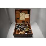 A vintage marine sextant in wooden box.