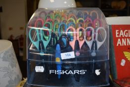 A boxed selection of Fiskars craft shears and scissors.