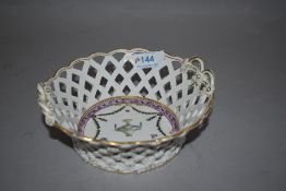 A Victorian Royal Crown Derby fruit basket bearing blue crown mark, having pierced sides with