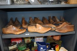 A selection of vintage and antique wooden shoes lasts.