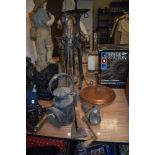 A wrought iron fireside companion set, a candlestick holder and a vintage road lamp etc.