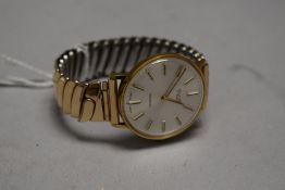A gent's gold plated quartz wrist watch by Avia having baton numeral dial to champagne face in