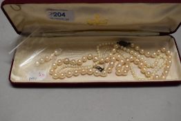 Two strings of pearls including baroque style