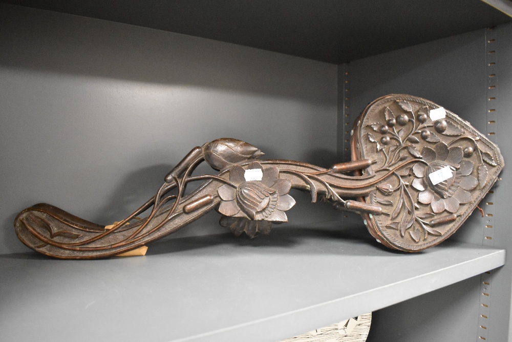 A set of 19th century extensively carved hardwood bellows, having flora and berry design. - Image 3 of 3