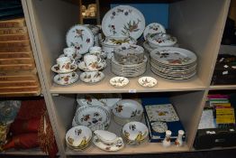 A 20th century Royal Worcester Evesham pattern dinner tea and breakfast service over two shelves