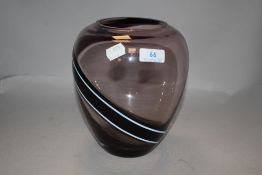 A large Caithness vase having Amethyst band edged with white to paler ground.
