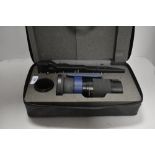 An Olympus Camedia TCON-300 Tele extension zoom lens and support in case