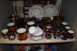 A large quantity of predominantly Victorian lustre and gilt detailed jugs, cups and saucers, bowls