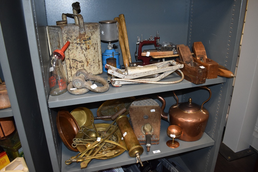 An assortment of vintage hardware and garage equipment to include vintage Lucas battery filler,