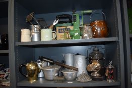 An assortment of vintage kitchenalia, including enamel mugs, iron, mincer and similar.