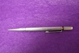 A HM silver retracting pencil having inscription to barrel ' 1921 JWP 1968'. AF.