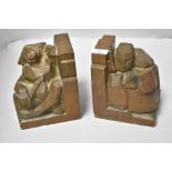 A pair of Art Deco abstract carved oak book ends.