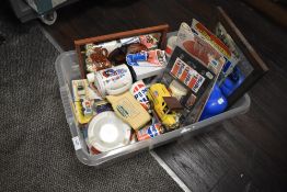 A box of Pepsi collectables, including ash tray, cars, mirror and more.