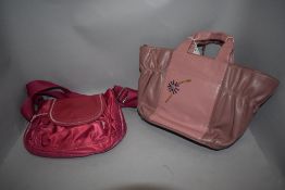 Two pink Radley handbags in good condition.