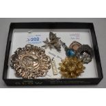 A selection of HM silver and white metal jewellery stamped silver including brooches, ingot
