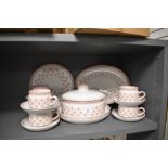 A collection of 1980s Denby 'Falling Leaves', comprising of cups and saucers, platter, plates and