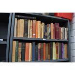 Two shelves of medieval and middle age related history text books