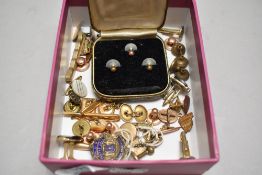 A selection of early 20th century button studs and yellow metal cuff links