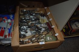 A box full of vintage cutlery, to include bone handled knives etc.